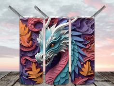 an image of a dragon made out of paper on a wooden floor with the sky in the background