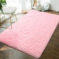 Lochas Soft Shaggy Rug Plush Modern Indoor Area Rugs Fluffy Floor Carpet for Living Room Home Decor Nursery, 4'X6',Pink Lochas Area Rug has the capability to brighten any room with a lively pop of color. In addition, the fluffiness will make any space feel comfortable and provide it with warmth. After a busy day, rug can make your feet feel soft, keep your feet off the cold ground, and give you the feeling of walking on clouds. The rug also acts as a muffler, filling your home with tranquility a Fluffy Bedroom, Girls Room Rugs, Nursery Carpet, Dorm Living Room, Plush Area Rugs, Pink Carpet, Bedroom Rugs, Bedroom Area Rug, Fluffy Rug