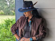 The Azul felt hat is 100% wool and has a 3.5" brim and 4.25" crown. Hand laced in royal blue leather lace that really complements the striking beaded hatband along with the feathers. Finished with a deer antler bead. NOTE: All hats are made to order. Allow up to 4 weeks for your hat to ship. Antler Beads, Red Kangaroo, Laura Ingalls, Felt Fedora, Millinery Hats, A Deer, Deer Antler, Suede Lace, Felt Hat