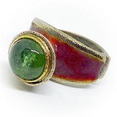 "Exclusive oxidised Sterling silver and 18K Gold ring (bezel) with a beautiful 10 mm green round Tourmaline. High quality handmade 18K Gold and oxidised Sterling silver ring. Reddish Enamel. Ring size: USA: 6 , DE: 52 (16,5 mm). ESP: 12, UK: M, FR: 52, IT: 12. If it's not size required, we can make an order custom ring for you. Delivery time a week plus shipment. If you need more information about the dimensions or more images to improve the idea of how it is or how it can be, do not hesitate to Unique Jewelry Necklace, Watermelon Tourmaline Ring, January Birthstone Rings, Rose Quartz Jewelry, Rose Gold Quartz, Pink Tourmaline Ring, Ring Bezel, Tourmaline Jewelry, Rose Quartz Ring