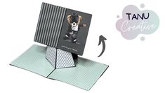 an origami card holder with a bear on it's front and bottom