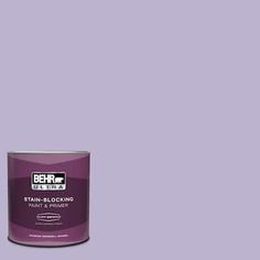 a can of behr ultra stain - blocking paint on a purple background with the words,