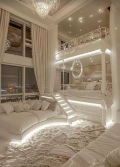 a large white bed sitting in the middle of a bedroom next to a tall window