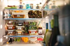 an open refrigerator filled with lots of food