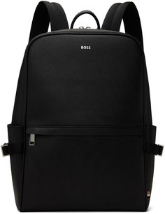 Saffiano regenerated leather backpack in black. · Logo-woven webbing straps throughout · Rolled carry handle · Adjustable shoulder straps · Logo stamp and zip pocket at face · Patch pocket and compression strap at sides · Padded mesh back face · Two-way zip closure · Padded laptop compartment · Zip pocket at interior · Logo-woven satin lining · Silver-tone hardware · H16 x W11 x D4 Supplier color: Black Modern Coated Canvas Backpack With Adjustable Strap, Modern Backpack With Adjustable Strap In Coated Canvas, Black Backpack With Adjustable Strap For Business Trips, Modern Saffiano Leather Bag With Leather Trim, Black Coated Canvas Backpack With Adjustable Strap, Modern Black Backpack With Leather Trim, Modern Coated Canvas Backpack, Modern Black Leather Backpack With Leather Trim, Modern Black Leather Backpack With Trim