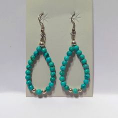 Just Made And Never Worn. Teardrop Shaped Earrings That I Hand Beaded With Authentic Kingman Turquoise Blue Beads, 2 Sterling Silver 5mm, One 7mm Sterling Silver Bead On Each Earring, And Ear Wires Are Stainless Steel. Hand Strung On A Soft Flex Steel Wire So Sturdy And Quality Is A Must Of Longtime Wear. These Are Part Of My West Star Collection. All Questions And Comments Are Welcome. Adjustable Beaded Turquoise Teardrop Earrings, Blue Teardrop Jewelry With Silver Beads, Turquoise Teardrop Beaded Earrings For Gifts, Turquoise Teardrop Beaded Earrings As Gift, Handmade Turquoise Teardrop Earrings With Round Beads, Turquoise Teardrop Polished Bead Jewelry, Turquoise Teardrop Jewelry With Polished Beads, Bohemian Blue Earrings With Polished Beads, Blue Bohemian Earrings With Polished Beads