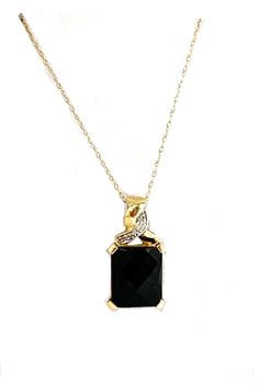 This 14K yellow gold onyx and diamond pendant necklace has a crossover design. The checkerboard cut onyx measures about 12mm x 10mm and the diamond accent gives a bit of sparkle to the design. Stamped 14K. The chain is 18 inches long with a spring ring clasp.  If you would like a different length or style of chain, just get in touch - we have lots to choose from! Please get in touch with any questions you may have - I am here to help! We have been in the jewelry business in Arizona for over 30 years. We have many pieces in our brick and mortar store not listed here, so please get in touch if you are looking for something special. And check back to our Etsy shop - we are always adding new pieces! Diamond Pendant Necklace, Jewelry Business, Spring Rings, Diamond Pendant, 30 Years, Pendant Necklaces, Crossover, Onyx, Jewelry Necklace Pendant