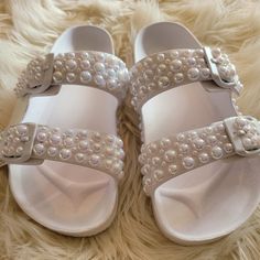 White Bedazzeled Sandals. Size 7, Never Worn. White Synthetic Jelly Sandals For Party, White Adjustable Jelly Sandals For Spring, White Adjustable Jelly Sandals For Summer, Adjustable White Jelly Sandals For Summer, White Adjustable Open Toe Jelly Sandals, White Flip Flops With Buckle Closure For Summer, Summer White Flip Flops With Buckle Closure, White Buckle Closure Flip Flops For Beach, White Adjustable Jelly Sandals