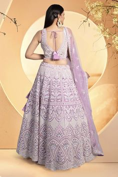 Take your party outfit to the next level with our Party Wear Lehenga D-282. This stunningly crafted lehenga features intricate pearls, mirrors, and stones work, adding a touch of elegance and glamour. Stand out in style and make a statement at any event. Anarkali Choli With Pearl Embroidery For Festive Occasions, Anarkali Style Lehenga With Pearl Embroidery For Festive, Bollywood Style Festive Anarkali Set With Pearl Embroidery, Festive Bollywood Anarkali Set With Pearl Embroidery, Navratri Anarkali Set With Pearl Embroidery, Festive Lehenga With Pearl Embroidery In Traditional Drape, Festive Semi-stitched Lehenga With Pearl Embroidery, Festive Anarkali Choli With Pearl Embroidery, Festive Lehenga With Pearl Embroidery And Traditional Drape