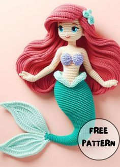 a crocheted mermaid doll laying on top of a pink surface with the words free pattern below it