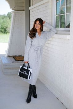 Effortlessly chic and comfortable, our Ribbed Waist Tie Sweater Dress in heather grey is a must-have for any wardrobe. Featuring a collared v neckline and waist tie detail, this midi length dress is crafted from soft ribbed knit for a cozy and flattering fit. Elevate your look with this versatile and stylish piece! 74% acrylic, 22% polyester, 4% spandex Model is 5'3" with a 32" bust, 25" waist, and 38" hips wearing a size small Size rec: 0-4 S 4-6 M 8-10 L Tie Sweater, Shoes Sandals Heels, Dresses By Length, Elevate Your Look, Midi Length Dress, Short Rompers, Waist Tie, Skirt Pants, Set Dress