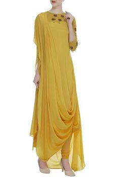 Shop for Nidhika Shekhar Yellow Cowl Draped Kurta With Churidaar for Women Online at Aza Fashions Baseboard Styles, Kurta Lehenga, Baggy Tops, Yellow Lehenga, Cowl Dress, Kurti Designs Party Wear, Indian Gowns, Traditional Attire, Indian Designer Outfits