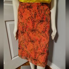 Elevate Your Bohemian Style With This Stunning Gianni Bini Floral Midi Skirt In Vibrant Orange. The Skirt Features A Flattering A-Line Silhouette With A Mid-Rise Waist And Knee-Length Hemline. The Floral Pattern And Sheer Lining Add A Touch Of Femininity And Elegance To The Piece, Making It Perfect For Any Occasion. The Skirt Has A Convenient Zip Closure And Requires Dry Cleaning Only For Garment Care. Whether You're Dressing Up For A Special Event Or Keeping It Casual For A Daytime Outing, This Casual Orange Pencil Skirt, Bohemian Orange Floral Print Skirt, Orange Floral Print Long Skirt, Orange Floral Print Skirt, Spring Orange Relaxed Skirt, Spring Orange Relaxed Fit Skirt, Orange Midi Skirt For Spring, Flowy Orange Skirt For Spring, Casual Orange Floral Print Skirt