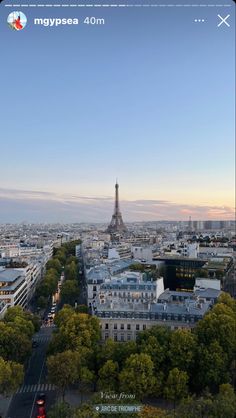 the eiffel tower towering over the city of paris, france at sunset time