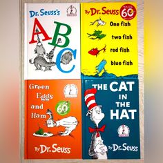 dr seuss's books are displayed on the wall