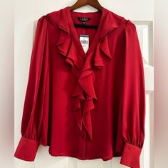 Bnwt Ralph Lauren Ruffle-Front Button Down Blouse. Size Xs But Has A Loose Fit. The Color Is Not A Bright Red As The Pictures Show. It's A Burgundy/Wine Color But The Camera Wouldn't Pick It Up. Comes From A Non-Smoking Home! Red Button-up Ralph Lauren Top, Ralph Lauren Red Button-up Top, Ralph Lauren Tops With Button Closure For Work, Elegant Ralph Lauren Spring Blouse, Red Suit, Burgundy Wine, Wine Color, Button Up Blouse, Wine Colored