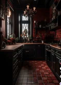 an image of a kitchen setting with red tile on the floor and black cabinets in the background