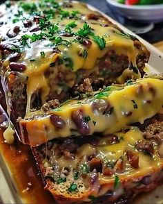 meatloaf stuffed with cheese and vegetables on a plate