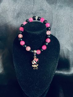 Handmade Pink and Black Minnie Mouse Stretch Charm Bracelet. Customizing available Message for more detail. Black Minnie Mouse, Personalized Bracelets, Colorado Springs, Pink And Black, May 1, Charm Bracelets, Minnie Mouse, Springs, Colorado