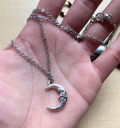 The moon is Earth’s partner, a part of Earth’s life that has effected us emotionally and scientifically! This moon pendant looks the same in the front ant the back, therefore allowing it to be a waxing crescent moon phase or a waning crescent moon phase, depending on which side it’s flipped on. Product Description: Necklace; silver crescent moon charm with a face- 20mm in length, 5mm in width 16” stainless steel chain with stainless steel lobster clasp Product Type: necklace window.dataLayer = w Half Moon Metal Necklace For Gift, Half Moon Metal Necklace For Gifts, Crescent Moon Phase Metal Necklace, Symbolic Crescent Moon Phase Necklace, Crescent Moon Print Jewelry As A Gift, Half Moon Jewelry With Moon Print For Gift, Crescent Moon Print Jewelry For Gifts, Crescent Moon Print Jewelry Gift, Moon Phase Metal Necklace In Moon Shape