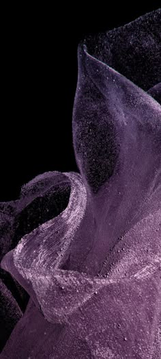 an abstract photo of purple and black material