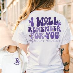 I Will Remember For You Shirt, Butterfly Alzheimer's Awareness Shirt, Alzheimer Shirt For Mom Dad, Purple Ribbon, Family Support Alzheimer MATERIAL UNISEX T-SHIRT Material * Our shirts are composed of 60% cotton and 40% polyester for your comfort. Size Chart  * Feel free to refer to our size chart for the ideal fit of your t-shirts. * Explore a diverse range of sizes designed to accommodate every member of your family. UNISEX SIZING CHART Small: Length 28" - Width 18" (4-6) Medium: Length 29" - Width 20" (6-10) Large: Length 30" - Width 22" (10-14) XL: Length 31" - Width 24" (14-18) 2XL: Length 32" - Width 26" (18-20) 3XL: Length 33" - Width 28" (20-22) All measurements are approximations. Shirts may be within 1" of the dimensions listed The shirts were measured laying on a flat surface, s White Graphic Print Tops For Awareness Events, Purple Casual Top For Awareness Events, Casual Purple Top For Awareness Events, White Cotton Tops For Awareness Events, Alzheimer's Awareness, Alzheimers Awareness, Family Support, Purple Ribbon, Awareness Shirt