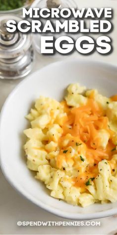 a white bowl filled with macaroni and cheese