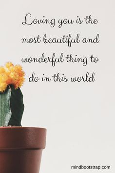 a small cactus in a brown pot with a quote on the side that says, loving you is the most beautiful and wonderful thing to do in this world