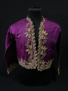 Antique Ottoman embroidered silk vest, This antique Anatolian handcrafted vest is made with classical Anatolian patterns on a purple silk separation background with metal threads. It is suitable for use by children and young people in usable sizes. It has orange  lining inside.  *Antique  *silk and metallic *Good condition Dimensions:20x18 inches, 53x46 cm   Shoulder width: 20 inches, 52 cm sleeve length:17 inç ,43 cm Violent Night, Vest Embroidery, Sewing Couture, Textile Embroidery, Antique Ottoman, Silk Vest, Velvet Vest, Turkish Fashion, Pretty Clothes