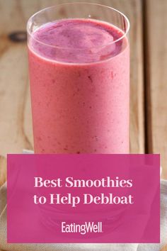 a pink smoothie sitting on top of a wooden table next to a glass with the words best smoothies to help deploat