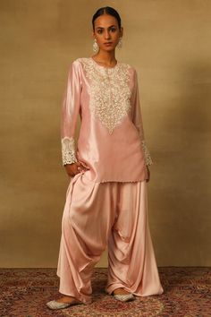 Powder pink short kurta with cutwork embroidery on yoke and cuffs. Paired with a plain harem pant. - Aza Fashions Pink Cutwork Sets For Festive Occasions, Festive Pink Cutwork Sets, Pink Cutwork Sets For Eid, Elegant Pink Cutwork Set, Elegant Pink Sets With Cutwork, Pink Wedding Sets With Cutwork, Traditional Pink Cutwork Sets, Embroidered Sets For Wedding And Eid, Fitted Cutwork Sets