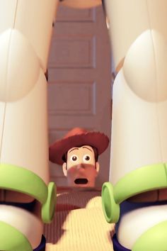 a cartoon character is standing in front of some tall white pillars and looking at the camera