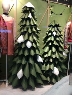 two christmas trees made out of green paper