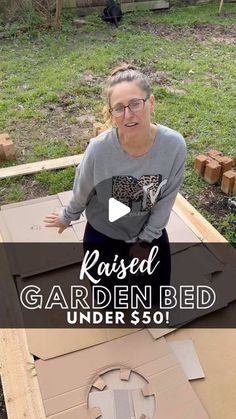 a woman standing in front of a raised garden bed with the words raised garden bed under $ 50