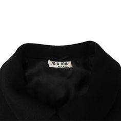 Miu Miu dress coat in black wool with a front double button closure, large pockets, and a belted waist with silver buckle hardware. Brand = Miu Miu Size = 36 Condition = 8/10, Very good. Some light pilling. Material = Wool SKU = 23643-9 Chic Luxury Miu Miu Outerwear, Luxury Miu Miu Outerwear With Pockets, Miu Miu Coat, Miu Miu Dress, Dress Coat, Scarf Jewelry, Outerwear Sweater, Sneaker Collection, Black Wool