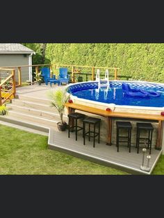 an above ground swimming pool in the backyard