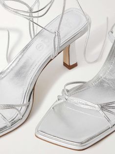 Modern Metallic Sandals For Evening, Sleek Silver Sandals With Padded Heel, Silver Sleek Heels For Summer, Silver Sleek Summer Heels, Sleek Silver Summer Heels, Leather Sandals For Summer Gala, Leather Sandals For Gala In Summer, Metallic Sandals With Removable Insole For Summer, Chic Silver Sandals With Heel Strap