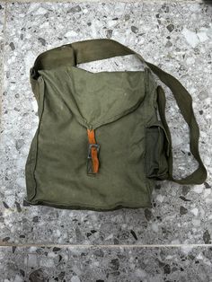 Vintage Genuine Military Shoulder Bag Haversack Tarpaulin Canvas Army Unisex  Soldier Equipment Very Rare 1967 Genuine Military Shoulder Bag Haversack Vintage Canvas Army Brand New Bag Strong Durable military canvas For professional use  One size fits all Unisex Swiss Army Gas Mask Bag, Vintage Green School Bag, Green Vintage School Bag, Vintage Crossbody Bag With Pockets, Vintage Satchel Shoulder Bag With Pockets, Vintage Outdoor Shoulder Bag With Pockets, Vintage Shoulder Bag With Pockets For Outdoor, Vintage Green Satchel With Adjustable Strap, Vintage School Bag With Pockets