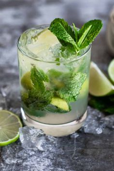 a mojito cocktail with lime and mint