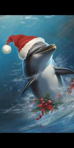 a dolphin wearing a santa hat in the water with christmas decorations on it's head