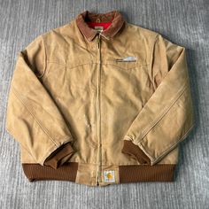 Vintage 2000s Carhartt Two Pocket Santa Fe Style Workwear Carpenter Heavy Duty Streetwear Brown Zip Up Jacket Extra Large Mens Condition: Fair Used Condition = Has distressing on the front of the jacket due to wear and age. Measurements: Please see photos above for all measurements IF YOU BUY TWO OR MORE ITEMS USE THE CODE BUNDLE @ CHECK TO SAVE 20% WE SHIP WITHIN 24 HOURS AFTER PURCHASE! Please be aware that we do not offer free returns!! The Buyer is responsible for the cost of the return labe Carpenter Jacket, Vintage Workwear Outerwear With Cargo Pockets, Dark Brown Carhartt Jacket, Old Carhartt Jacket, Carhartt Shoreline Jacket, Vintage Carhartt Jacket, Brown Zip Ups, Santa Fe Style, Extra Large