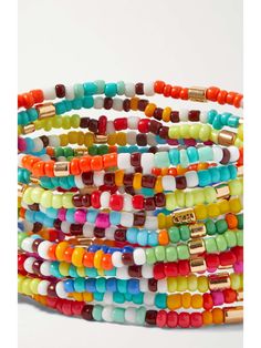 ROXANNE ASSOULIN New Patchwork set of 12 beaded bracelets | NET-A-PORTER Red Letter Beads Festival Jewelry, Red Bohemian Bracelets With Letter Beads, Bohemian Red Bracelets With Letter Beads, Red Bohemian Jewelry With Letter Beads, Bohemian Red Jewelry With Letter Beads, Multicolor Beaded Wrap Bracelet For Friendship, Multicolor Tiny Beads Wrap Bracelet For Friendship, Multicolor Beaded Jewelry For Friendship, Multicolor Tiny Beads Bangle