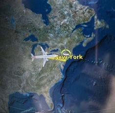 an airplane flying over the map of the united states and new york, with a yellow circle on it