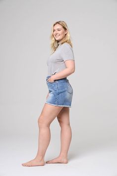 HIGH-RISE PLUS COMFORT STRETCH SHORTS WITH FRINGE HEM IN MEDIUM WASH 99% COTTON, 1% SPANDEX Leg Opening: 31" Front Rise: 13 1/4" Inseam: 4" Based on photo. Model is 5'11" and is wearing a size 1X. Relaxed Fit Medium Wash Bottoms With Built-in Shorts, High Rise, Relaxed Fit Shorts With Five Pockets, Shorts With Fringe, Mid-rise Medium Wash Jean Shorts With Hip Pockets, Relaxed Fit Shorts With 5-inch Inseam And Belt Loops, Denim 24/7 Plus Size Clothing, Photo Model, Stretch Shorts, Blue Shorts