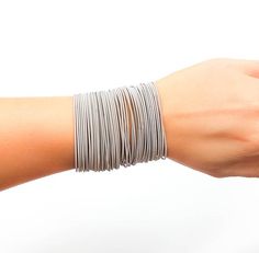 Stainless Steel Bracelets - Grey Silver - 8"Silver String Bracelet 8", Guitar String Bracelet 8 inch Stainless Steel, Grey Silver Spring Bracelet, Thin Silver Layered Bracelet SetSuper chic - single or stacked.► Total length - 8 inches♥♥♥♥♥♥♥♥► Nickel Free ✔► Tarnish Resistant ✔► No Allergic reaction ✔► 30 days return policy ✔► Accept replacements and custom orders ✔♥♥♥♥♥♥♥♥► I ship all items in a branded jewelry gift box ✔► Greeting card - upon request ✔♥♥♥♥♥♥♥♥Shipping information :► Tracking Spring Bracelets, Opal Band Ring, Silver Cuff Ring, Guitar String Bracelet, Flexible Bracelet, String Bracelets, Spring Bracelet, Steel Guitar, Gold Bracelet Set