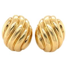 18K yellow gold Cartier oval ear clips with a swirl pattern in relief. The clips have a lovely vintage feel to them, are fully signed and numbered Cartier 603680, stamped 750 and with French assay mark. Length: 2.1cm long Weight: 19g Classic Cartier Earrings For Formal Occasions, Yellow Gold Oval Clip-on Earrings For Anniversary, Classic Yellow Gold Oval Clip-on Earrings, Gold Oval Clip-on Earrings For Formal Occasions, Formal Gold Oval Clip-on Earrings, Jewelry Rings Unique, Cartier Vintage, Cartier Earrings, Vintage Gold Earrings