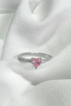 Rhodium Plated 925 Sterling Silver Pink Heart Ring | Infinite Elements 5A 8A Cubic Zirconia CZ Fancy Pink  Wedding Ring | Women Ring | Heart Silver Ring | Pink Stone Ring  | Valentine's Day | Mother's Day  The ring is handcrafted in solid 925 solid sterling silver and plating in rhodium for a polished look  Materials: 925 Sterling Silver Stone Color : Fancy Pink  Stone cut : Heart  For better understanding of our ring sizes: UK L - US 6  UK N - US 7  UK P - US 8  All our items will be nicely wrapped in a lovely jewelry pouch ready to be given as a gift If you have any further question, please don't hesitate to contact us ! Pink And Silver Ring, Silver And Pink Jewelry, Pink And Silver Jewelry, Promise Rings Pink, Silver Rings For Women Unique, Pink Wedding Ring, Wedding Ring Pink, Pink Heart Ring, Pink Rings