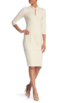 A sheath dress features a cutout mock neck with a twist for ultimate sophistication. Fit: this style fits true to size. Keyhole mock neck. 3/4 length sleeves. Back zip closure. Crepe fabrication. Approx. 40" length (size 2). ImportedThis item cannot be shipped to Canada. Chic Fitted Bodycon Dress With 3/4 Sleeve, Fitted Career Dress With 3/4 Sleeves, Formal Stretch Midi Dress With 3/4 Sleeve, Elegant Bodycon Dress With 3/4 Sleeves, Elegant Career Dresses With 3/4 Sleeves, Spring Midi Dress With Back Zipper For Work, Spring Workwear Midi Dress With Back Zipper, Spring Career Midi Dress Fitted, Bodycon Midi Dress With 3/4 Sleeve For Spring