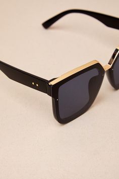 The Lulus Main Frame Black Rimless Sunglasses are our number one pick for make sure you've got that casual-cool style all season long! These semi-rimless sunnies have tinted gradient lenses (with shiny gold accents) and chunky black frames that are sure to make a statement! Frames Measures 5. 75" Long. Arms Measures 5. 5" Long. Man Made Materials. Imported. Lulus | Main Frame Black Rimless Sunglasses. Gold Rimless Sunglasses With Tinted Lenses, Gold Rimless Shield Sunglasses With Polarized Lenses, Gold Rimless Sunglasses With Uva Protection, Sleek Gold Sunglasses With Mirrored Lenses, Sleek Gold Sunglasses For Summer, Sleek Gold Sunglasses With Tinted Lenses, Gold Polarized Shield Sunglasses For Beach, Gold Shield Sunglasses With Polarized Lenses For Beach, Gold Cat Eye Sunglasses With Uv Protection For Beach