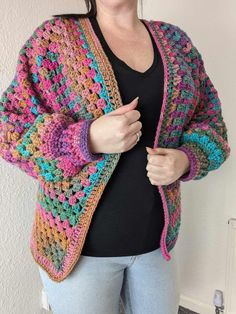 The latest addition to my etsy store is handmade cardigans, This cardigan is made with chunky yarn so it has a really thick warm feeling, Full of stunning bright shades of pinks, purples and blues and lots of other stunning colours, The perfect addition to your wardrobe, Looks stunning with jeans and a top. This cardigan has a ribbed edge around the entire cardigan and around the cuffs. I wear a size 16/18 UK time, This cardigan is a size 16. The measurements are 45 inch chest, 18 inch arm length and 12 inch cuff. It's stretchy and very soft on the skin. It's made with 100% acrylic yarn which means not only is it soft and warm its also machine washable. Hexagon Cardigan Crochet, Hexagon Cardigan, Retro Cardigan, Cardigan Handmade, Clothes Crochet, Cardigan Crochet, Crochet Hexagon, Crochet Clothing, Handmade Clothing